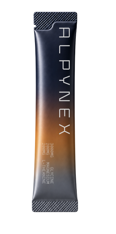 ALPYNEX single-serve stick in midnight blue with an orange gradient